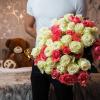 Man gifting flowers